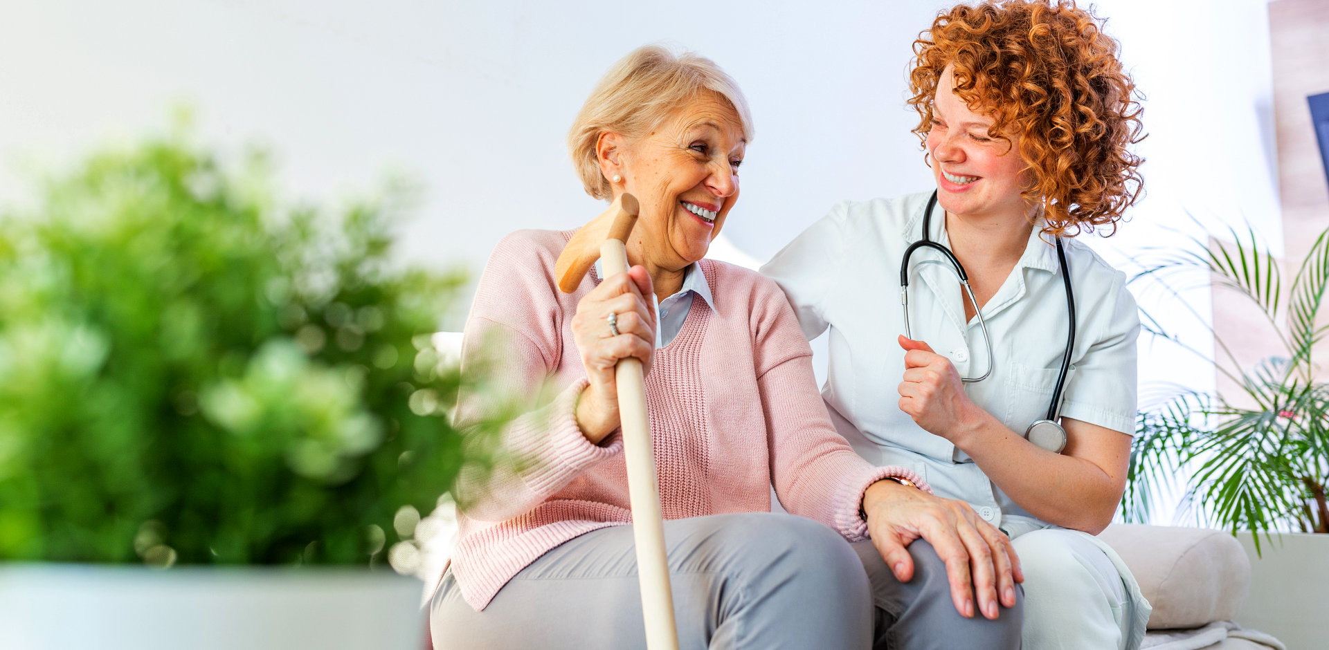 nurse and her patient happily talking