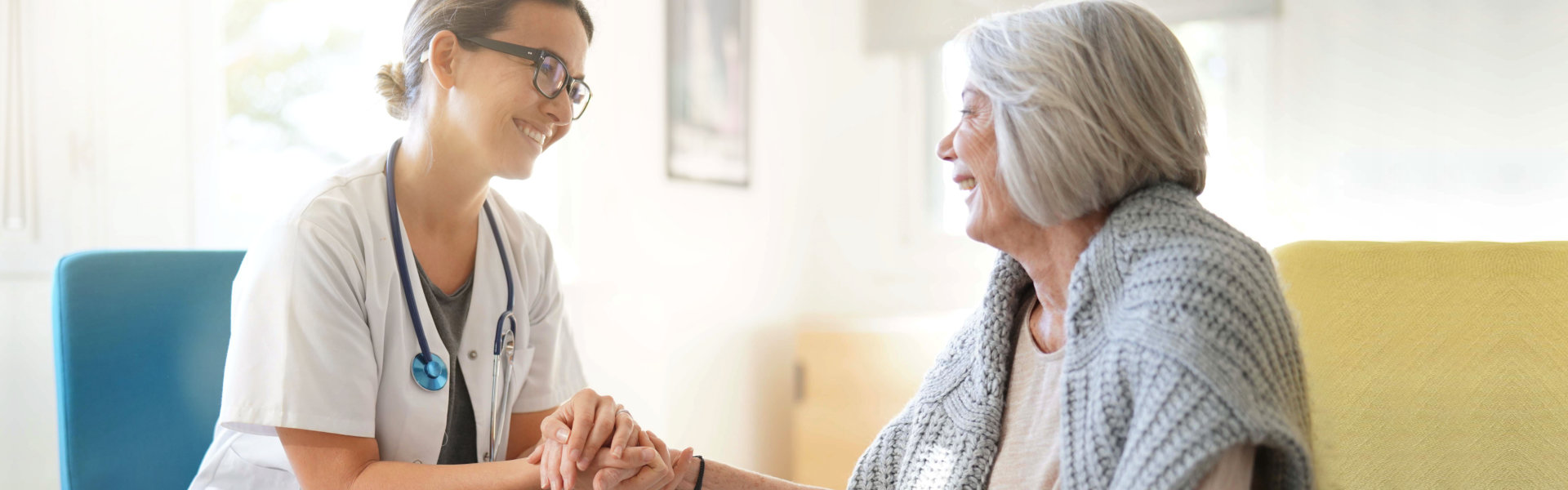 nurse talking to a senior woman