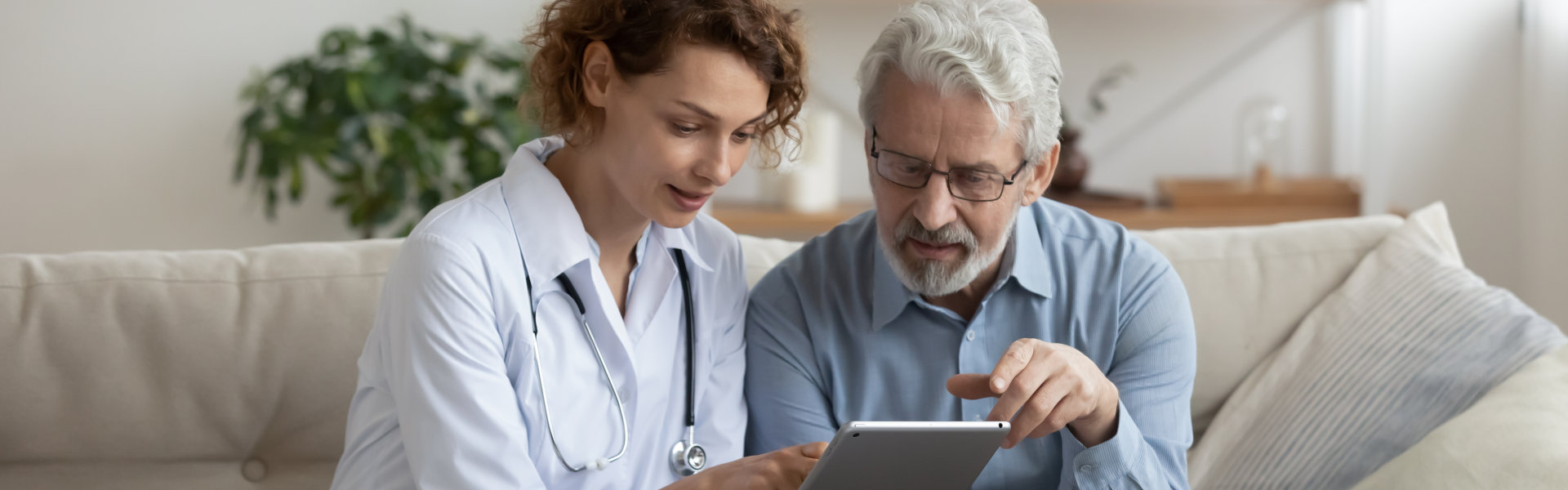 senior man talking to a nurse